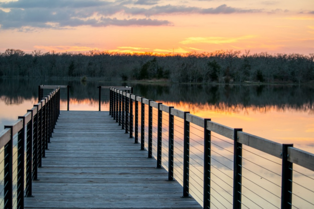 A dock at sunset at the Millican Reserve Land Conservancy
